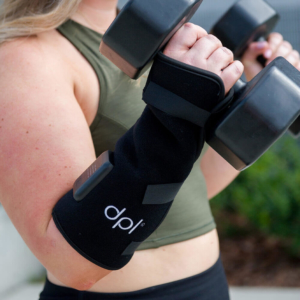Woman Working Out With Wrist Wraps On