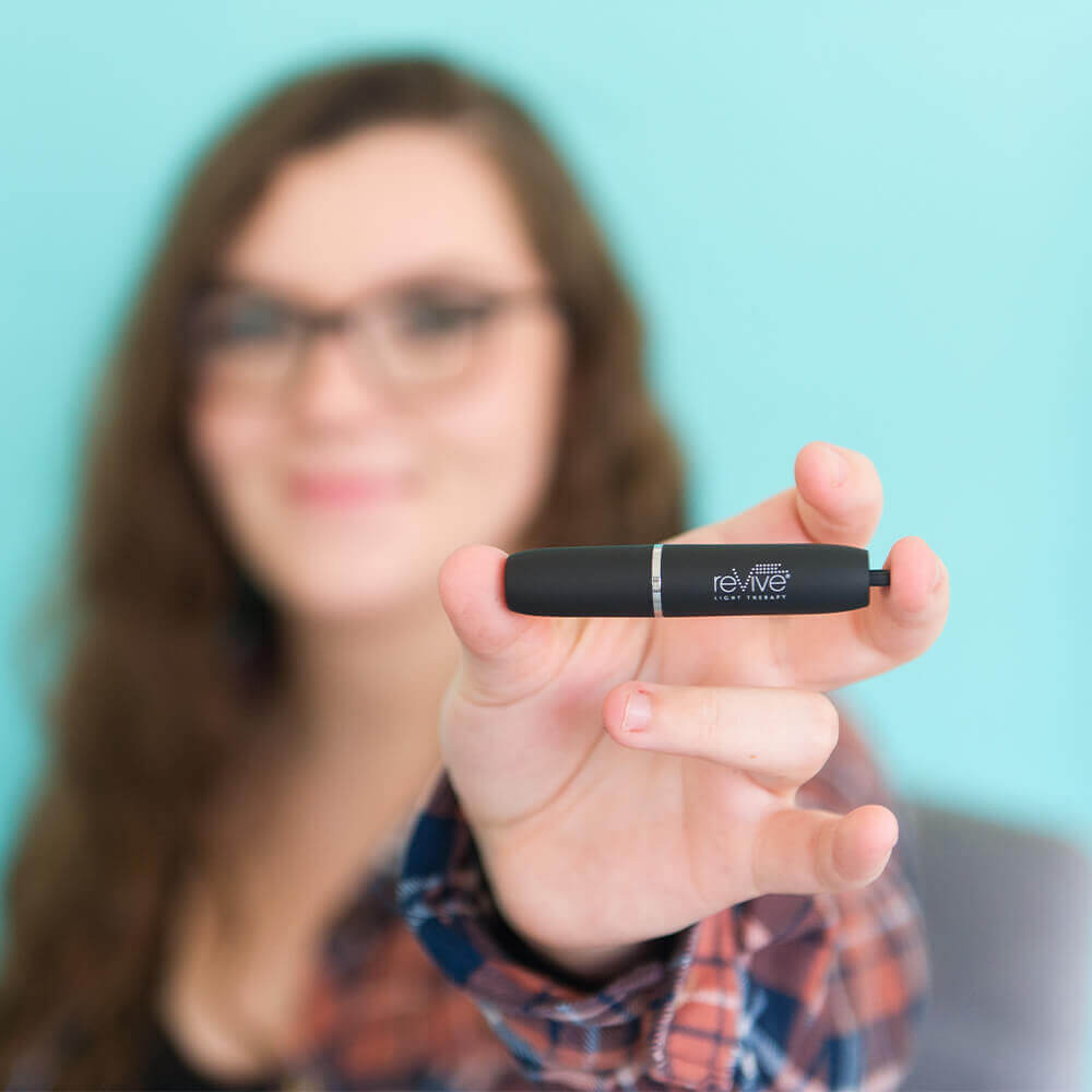 Girl Holding Poof Device Blurry