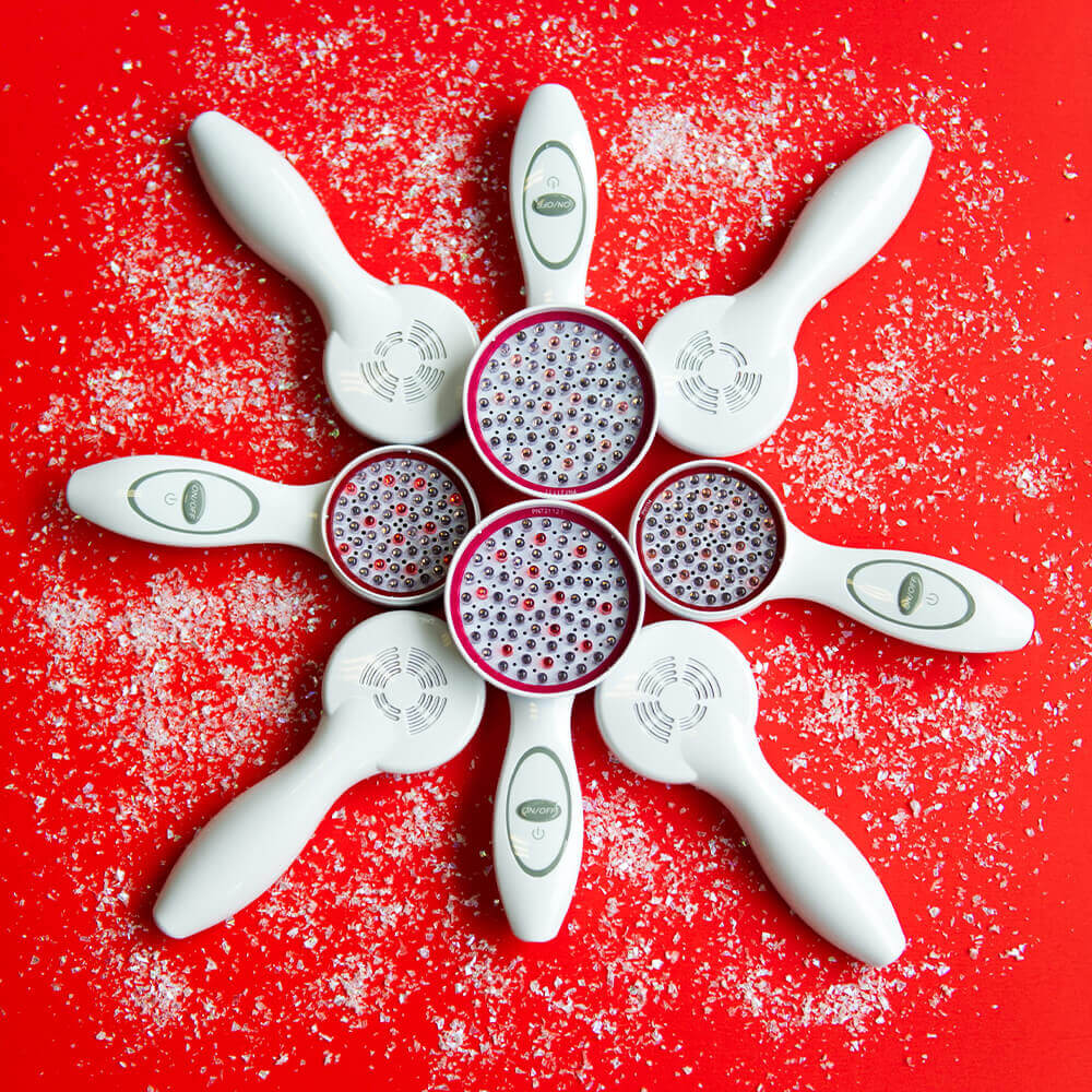 multiple dpl Clinical and Nuve devices forming a snowflake pattern on a red background