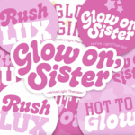 Pink and white graphics are stacked to emulate a pile of stickers