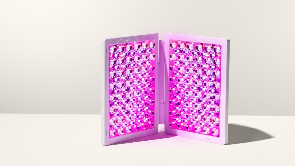 LED Technologies Lux Collection light therapy panel is propped up on white background, LED lights on